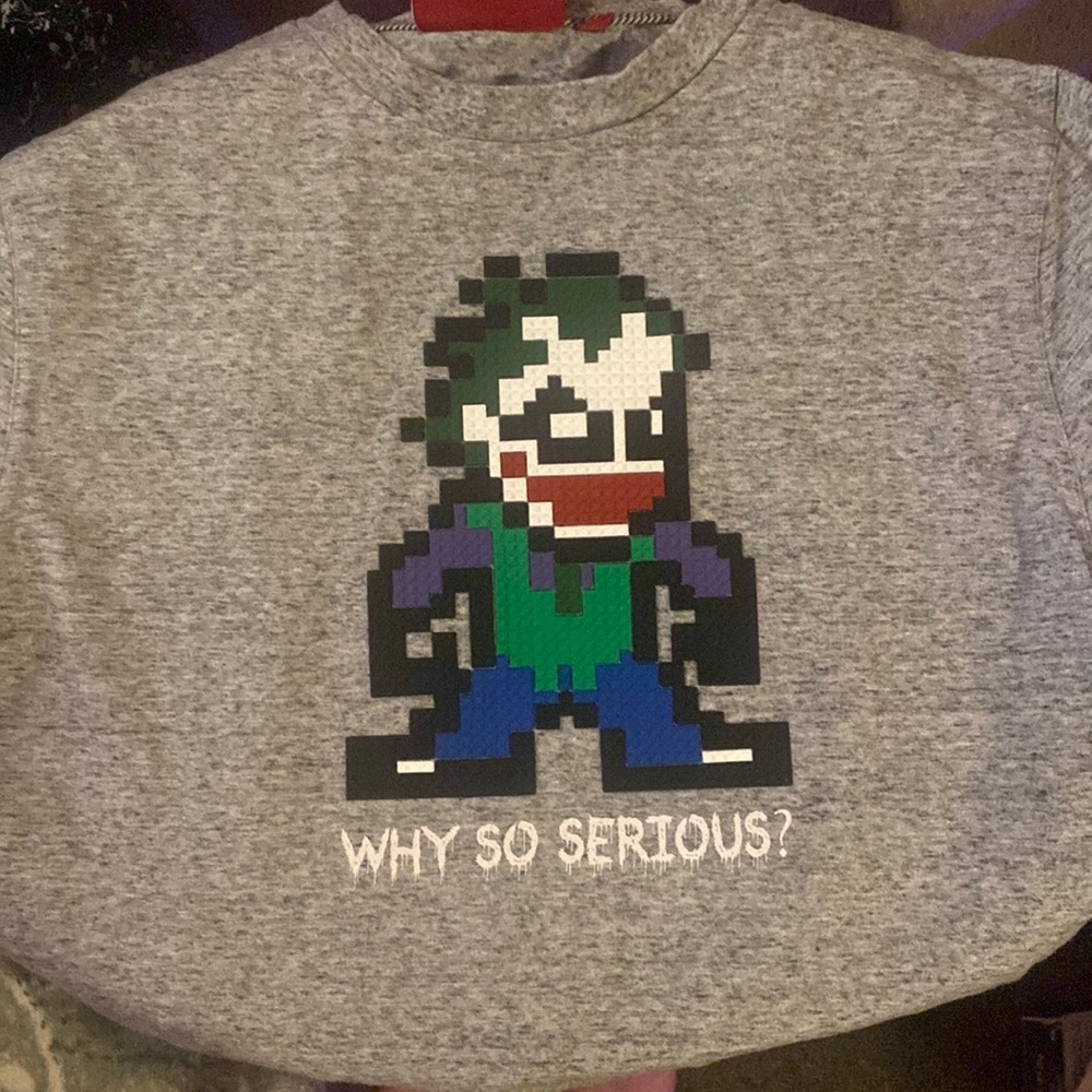 NWOT Mostly Heard Rarely Seen 8-Bit Pixelated Joker “Why So Serious?” T-Shirt